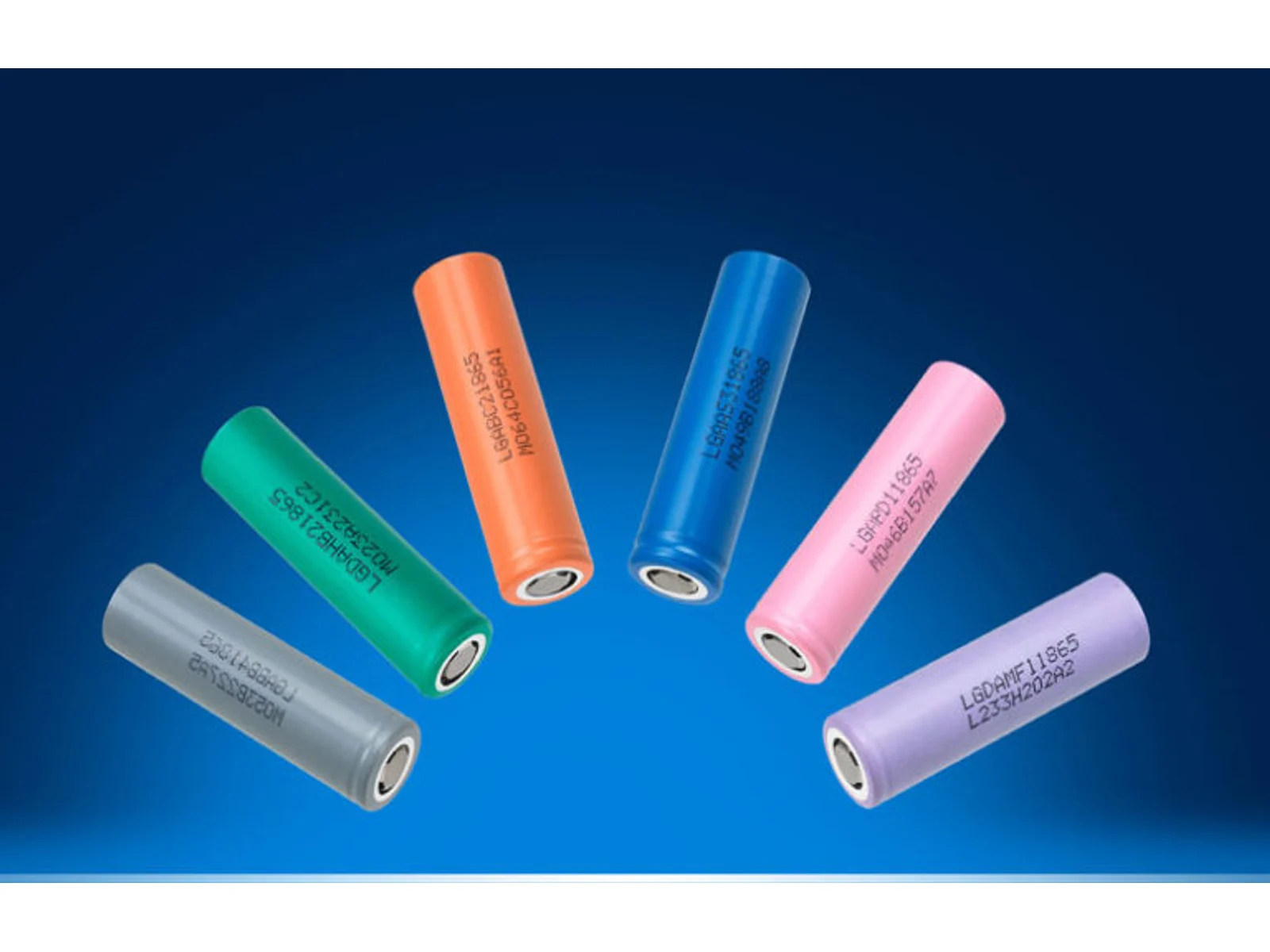 Six colored cylindrical battery cells arranged on a blue background
