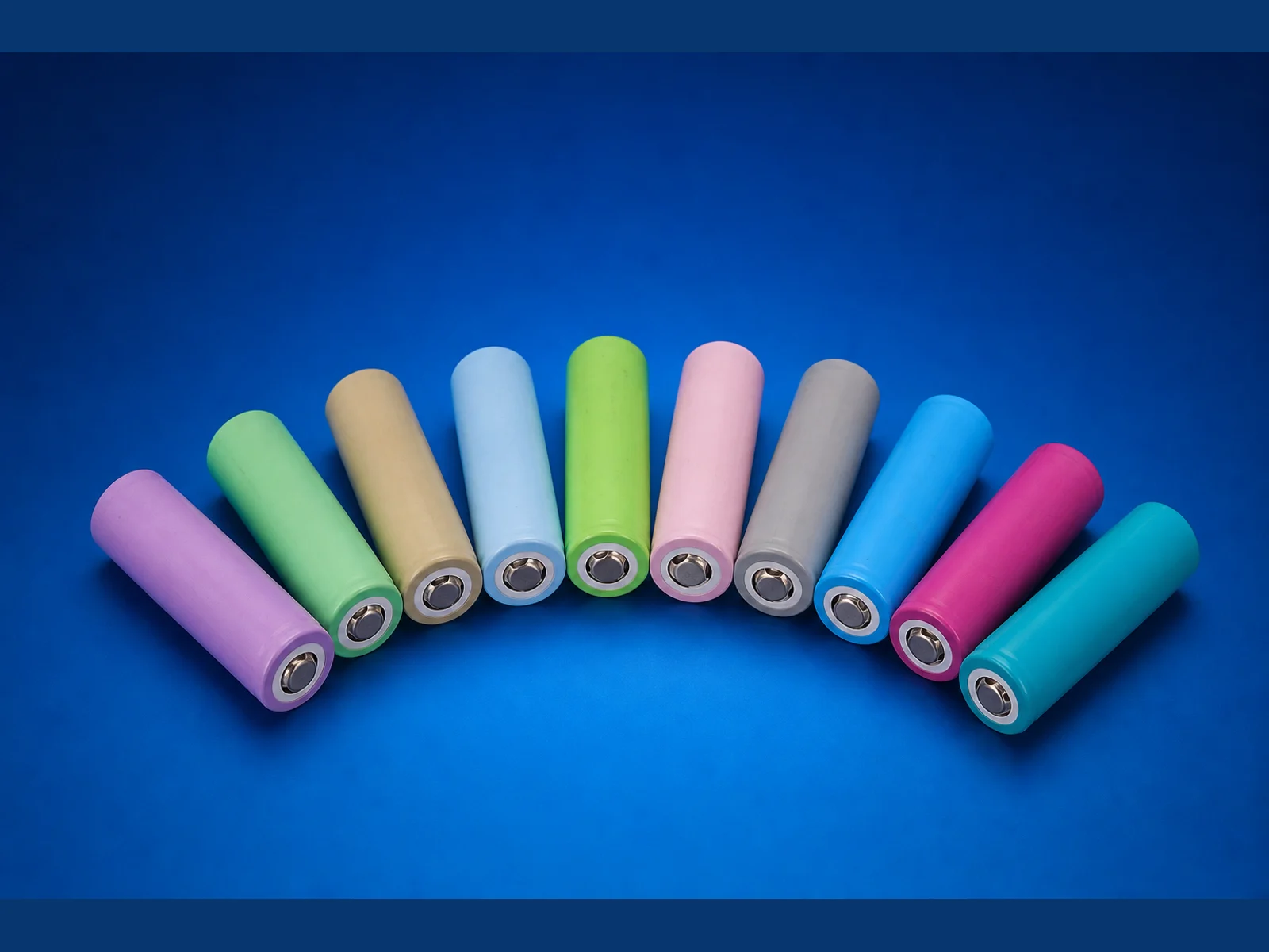 Illustration of a colorful cylindrical cell lineup on a blue background